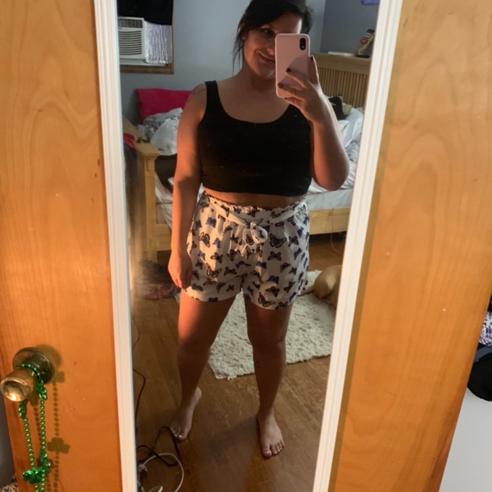 Black top and white butterfly shorts